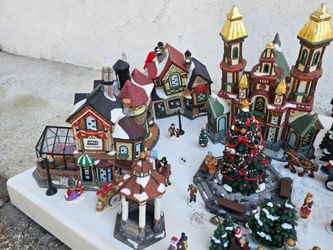 $200 or best offer Selling my Christmas village display from Costco all the lights work ready to go.