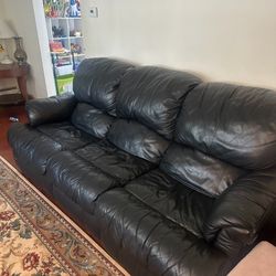 Two Black Leather Sofas