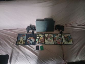 PS2 with games, controllers, and all chords