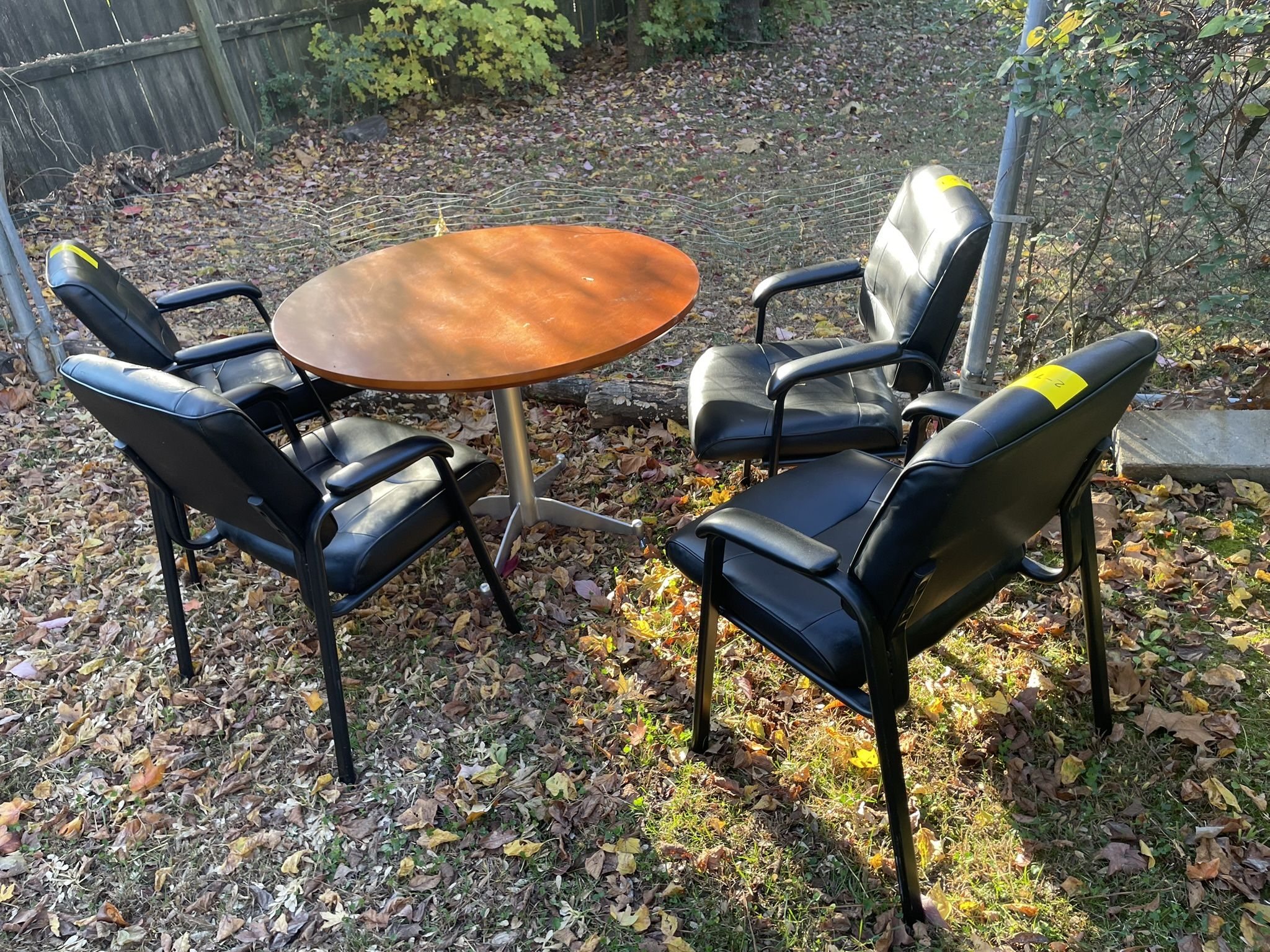 Tan Table Top With 4 Black Chairs Good Conditions