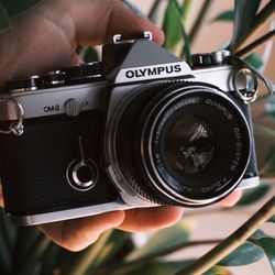 Olympus Om 2 with 50mm F1.8 lens film camera new light seals