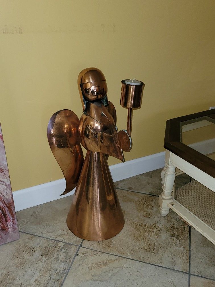 Copper.
Angel statue.