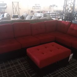 Red And Black Reversible Sectional With Ottoman 