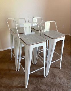 Four counter height kitchen stools