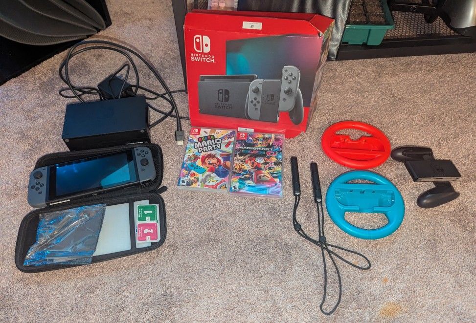 Nintendo Switch With 2 Games, 2 Steering Wheels And Carrying Case