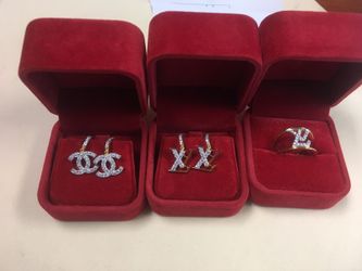 Designer earring and ring Silver plate 24k $100 each