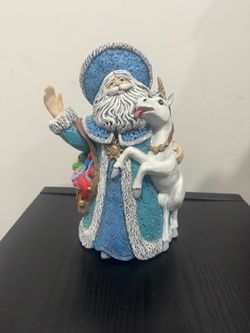 Santa Claus with Unicorn Figurine