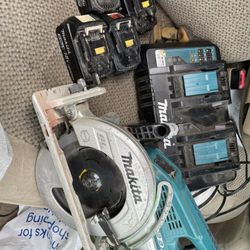 Saw, Double Charger, And 4 Batteries