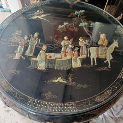 Chinoiserie Black Lacquer Pagoda Oriental Coffee Table And Six Stools With Mother Of Pearl Inlay.