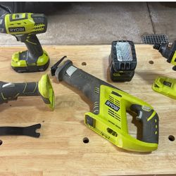 Ryobi 18 volt tool set. Drill, impact gun, reciprocating saw and angle grinder Charger 2 batteries