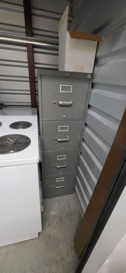 Commercial-grade vertical file cabinet Heavy-gauge painted steel