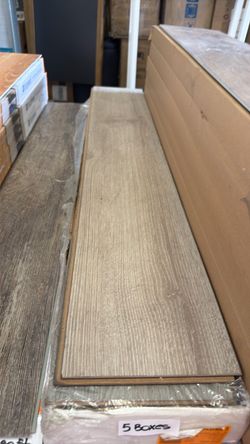 5 boxes laminate flooring $75