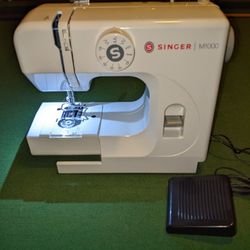 Singer M1000 mending machine.