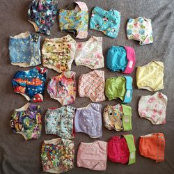 Lot of 22 Cloth Diapers One Size All in One with Snaps/Velcro with insert. No holes in the diaper, odor free, smoke and pets free home. Some are custo