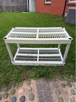 SHELF, plastic 36"w x 18"d x 19 1/2"tall; cross streets are Arapaho & Waterview