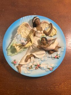 Black Angel Relief Figurines Mounted On Plate