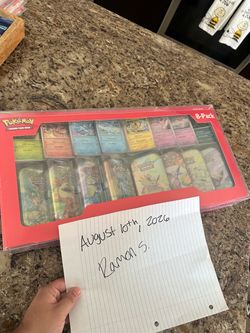 SEALED COSTCO PRISMATIC EVOLUTION 8 TIN COLLECTION