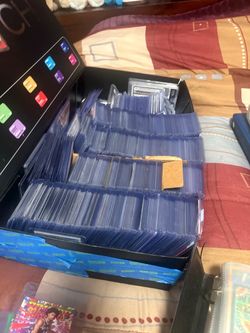 Large Lot of Trading Cards in Sleeves