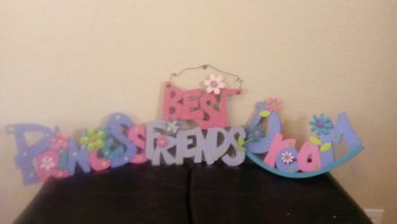 Painted wooden wall signs