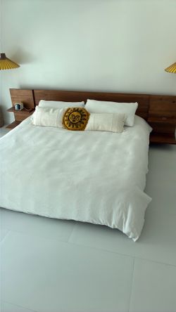 King bed with integrated side shelves