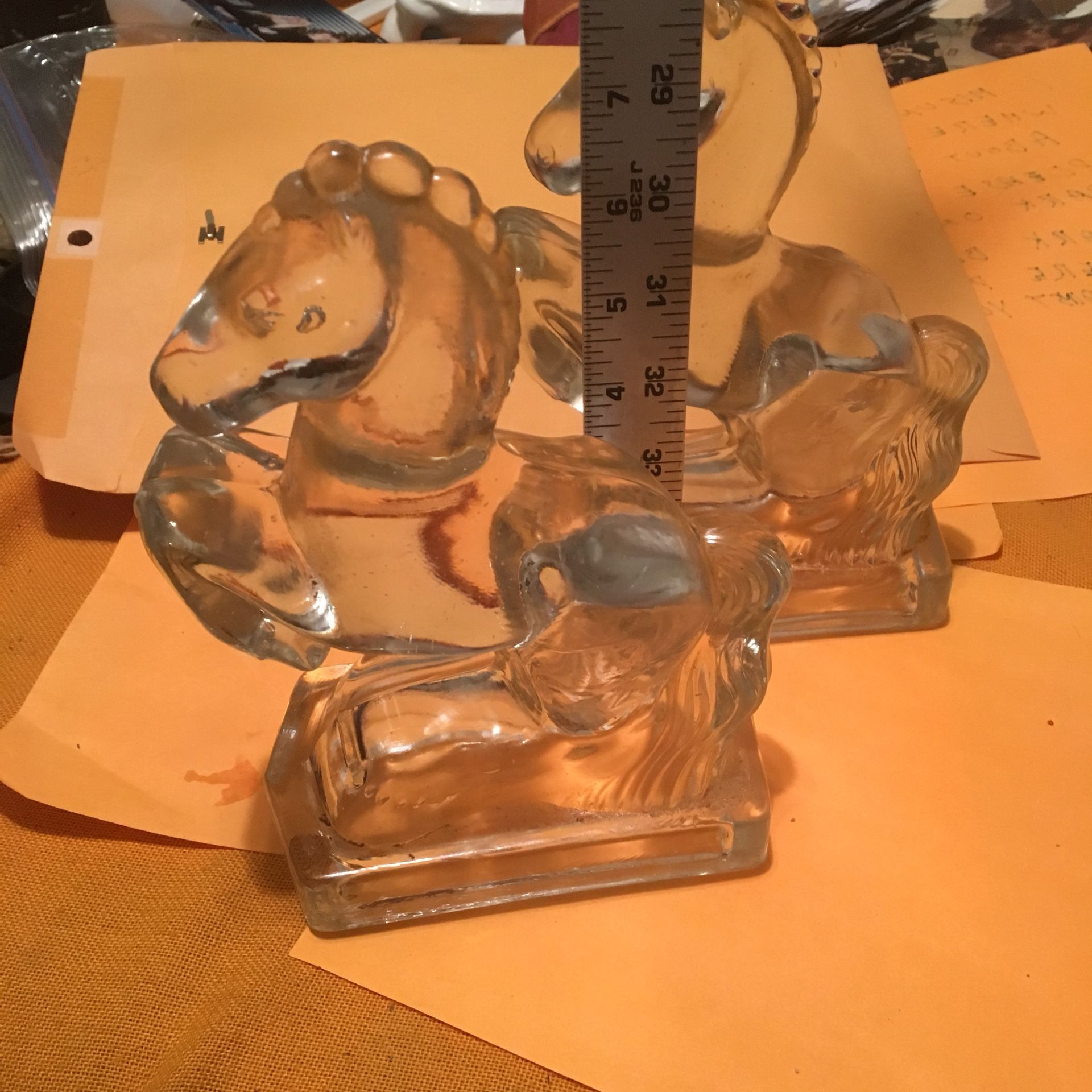 Two heavy glass horse bookends 8” tall