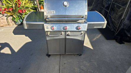 Weber Genesis stainless steel gas grill.