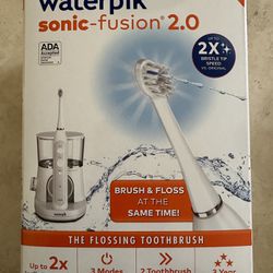 Waterpik Sonic-Fusion 2.0 Flossing Electric Toothbrush, White New, Sealed BRUSH FLOSS AT THE SAME TIME: Sonic-Fusion combines the power of an advanced