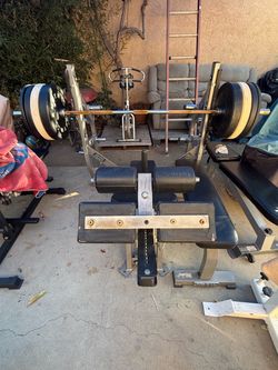 Hammer Strength Bench Press with Barbell and Weights