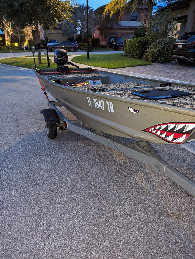 12ft Wide Jon Boat with A 9.9hp Trailer And Title 