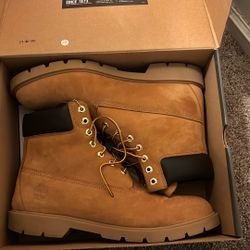 Tan High top Timberland Boots. Size 13. Gently Used. $100