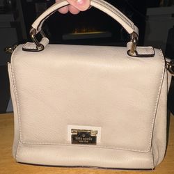 Kate Spade cream leather top-handle satchel with gold hardware