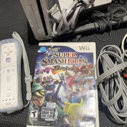 White Nintendo Wii with Smash Bross Game