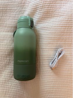 Momcozy portable bottle warmer for travel