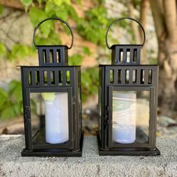 A pair of Black Metal Outdoor Lantern.  11” H x 6” W x 6” W. $20 for both. Price is firm. 