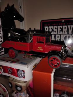 Vintage ERTL Hawkeye Tow truck also a bank with key