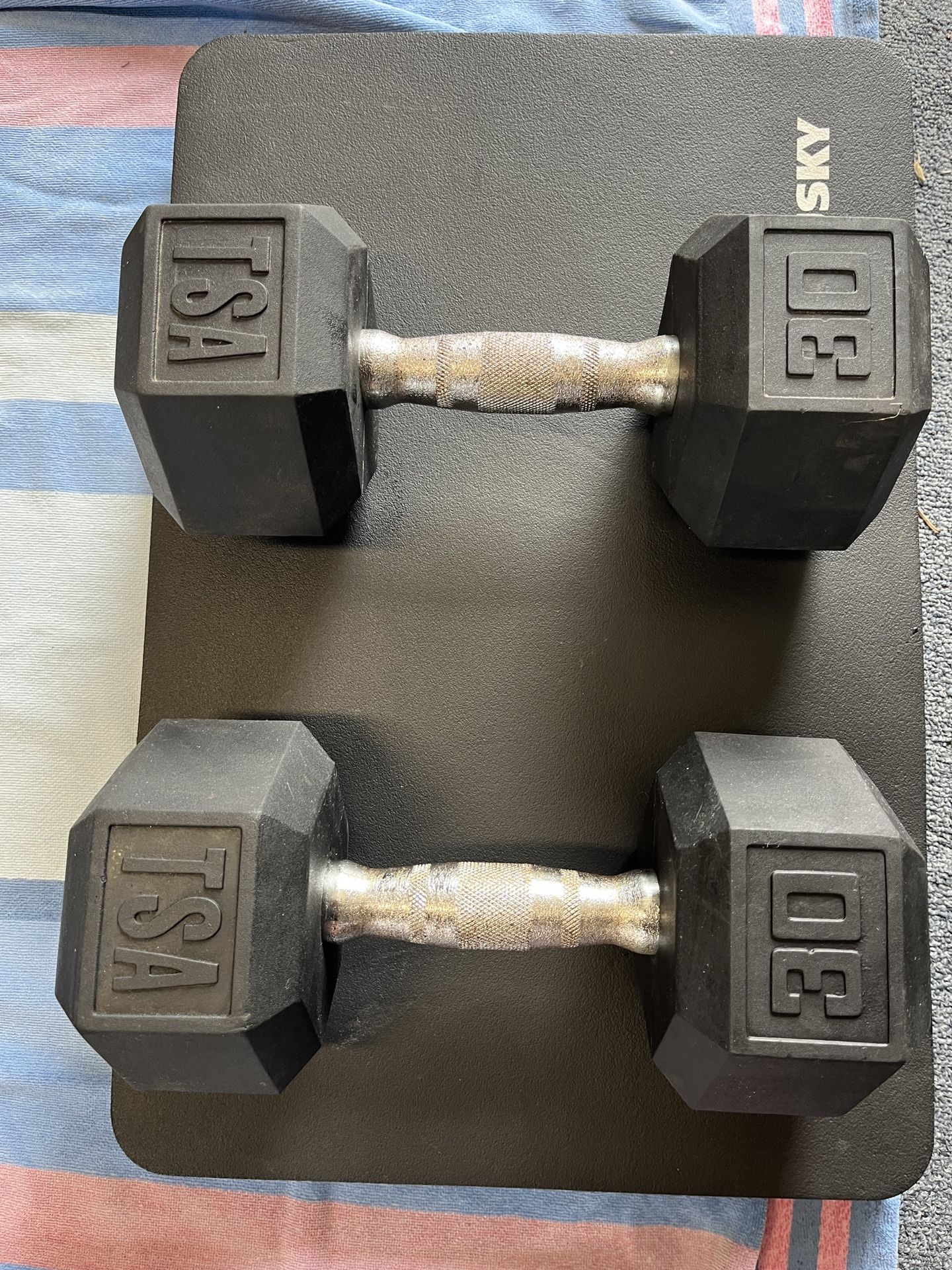 pair of 30 lb dumbbells