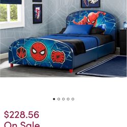 Two spider bed with dresser with the mattress with the comforter with the pillows everything