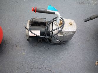 A/C compressor evacuator