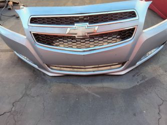 2013 -2015 Chevrolet Malibu front bumper with all the accessories.