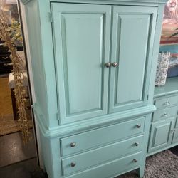 I Have A Blueish Armoire W/ Nickle Plated Knobs