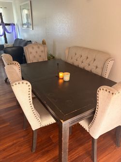 Dark Wood Dining Table with 4Tufted Chairs and a bench
