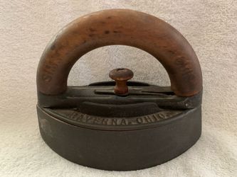 The A. O. Williams  Co.  Sad/ Solid Cast Iron with Wood Handle