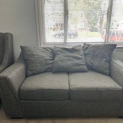 Gray loveseat couch- Matching armchair available 