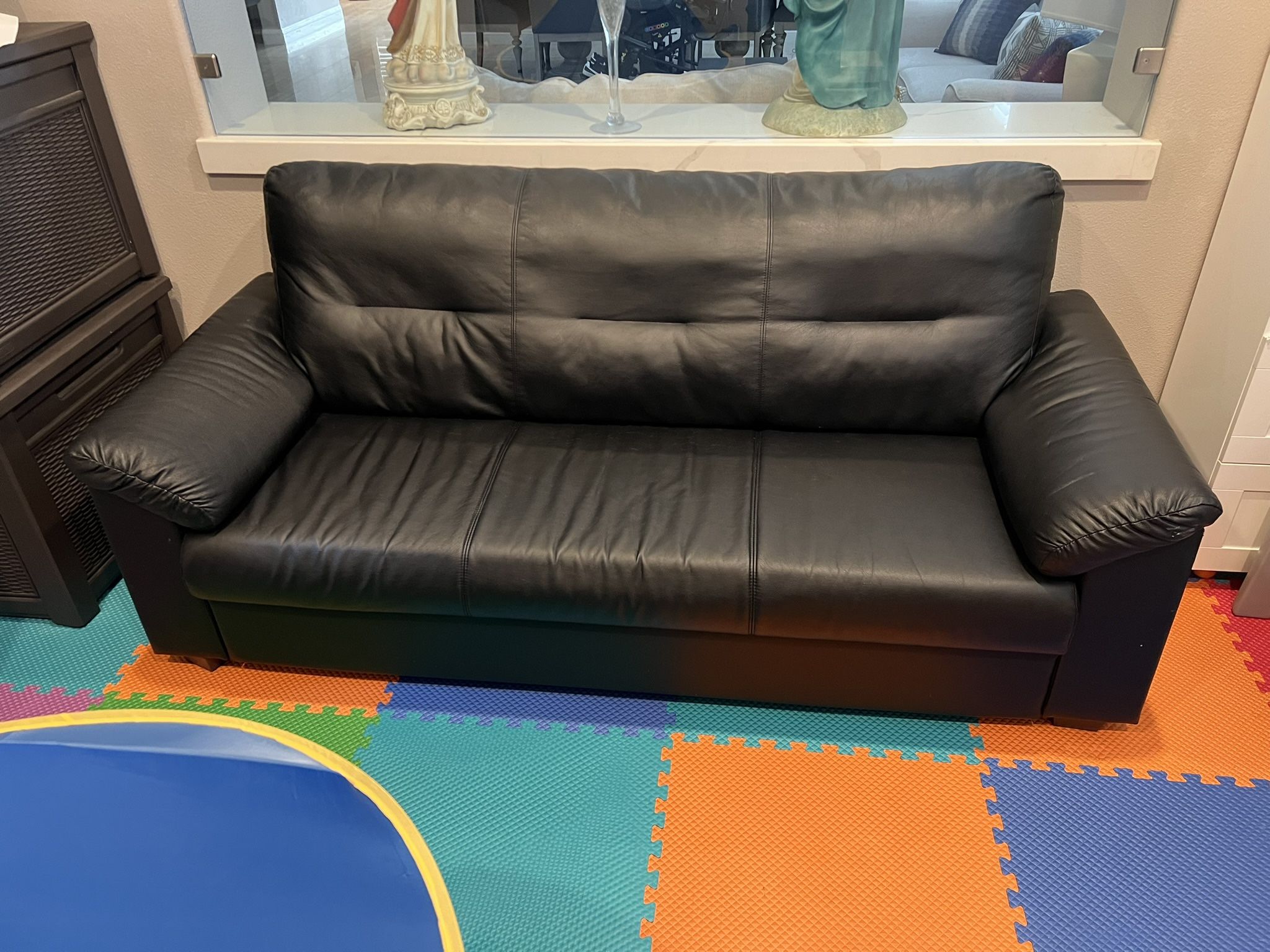 IKEA Black Sofa. Roughly 79 X35 Inches. Leather Fabric