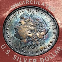 1883-O Morgan Silver Dollar / Natural Rainbow Tone / America Savings And Loan