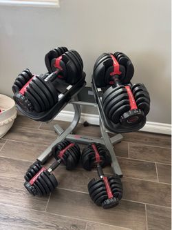 Bowflex 552 adjustable dumbbells and extra set