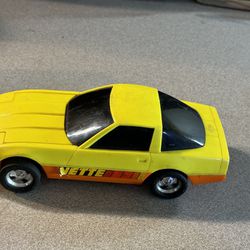  ERTL Corvette Plastic Friction Car Friction yellow 8”