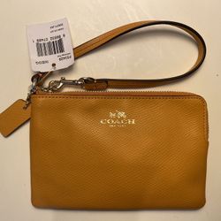 Brand new Coach Wristlet