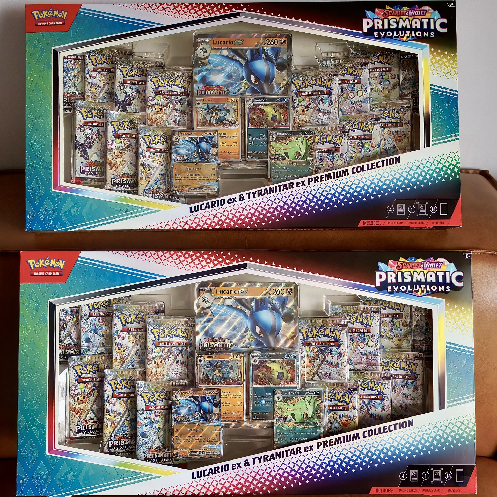 Pokémon Prismatic Evolutions Lucario & Tyranitar EX Premium Collection (2) – 28 Booster Packs – (FREE DELIVERY)