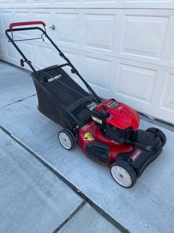 Good Troy-Bilt Self-propelled Lawnmower 190cc, 21”,  Auto choke, with bag.